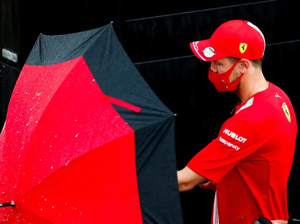 Sebastian Vettel umbrella rain