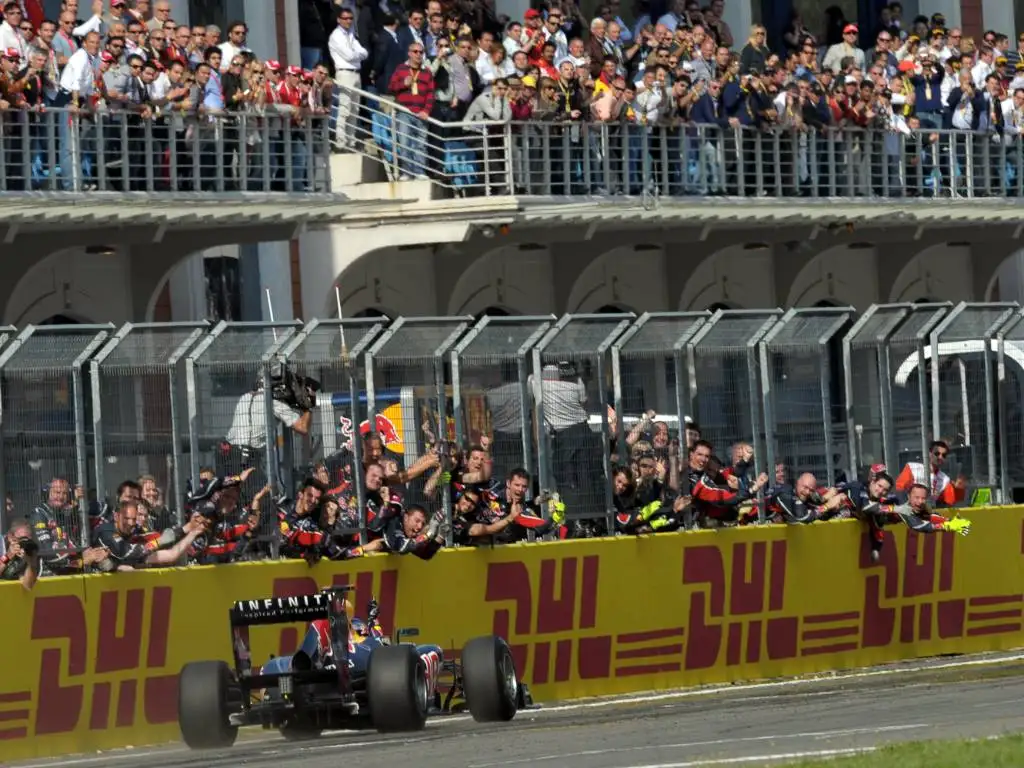 Sebastian Vettel crosses the line to win the 2011 Turkish Grand Prix