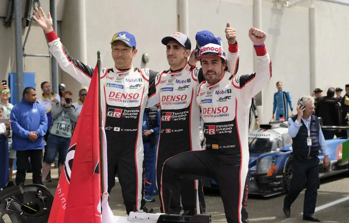 Fernando Alonso (right), Sebastien Buemi (centre) and Kazuki Nakajima celebrate their 2019 Le Mans 24-Hour Race victory