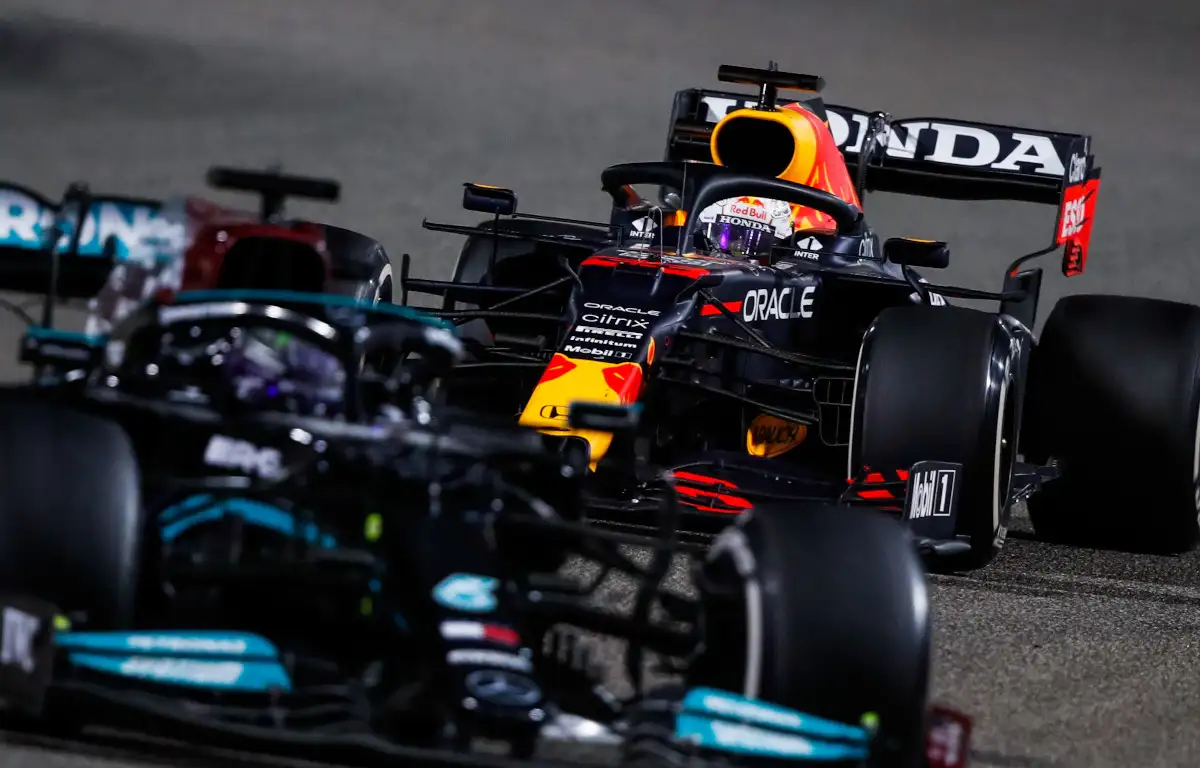 Lewis Hamilton in front of Max Verstappen