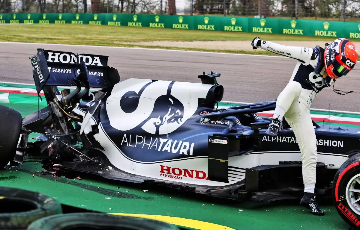 Yuki Tsunoda jumps out of his crashed AlphaTauri at Imola