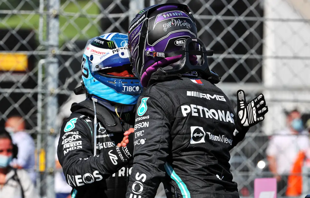 Lewis Hamilton and Valtteri Bottas shake hands. Hungary August 2021