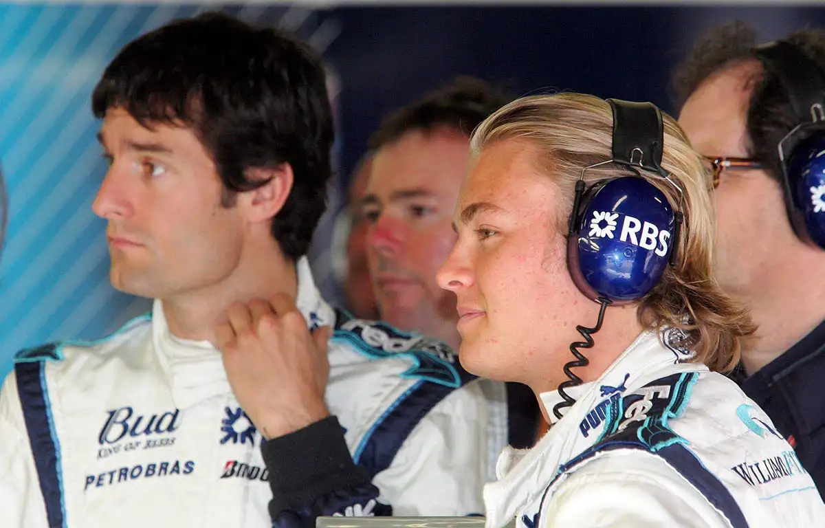Nico Rosberg and Mark Webber watch monitors. May Spain 2006