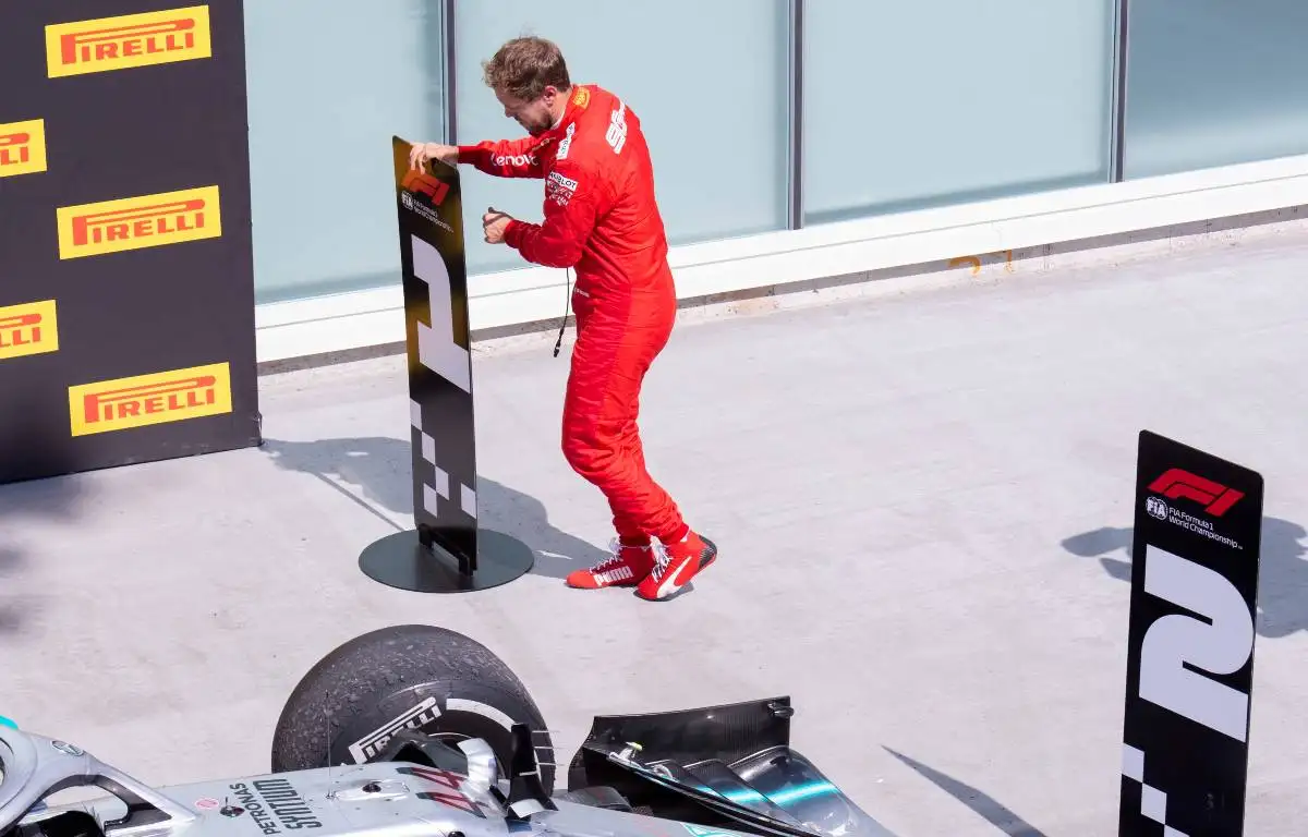 Sebastian Vettel swaps the marker boards after the Canadian Grand Prix. Montreal June 2019.