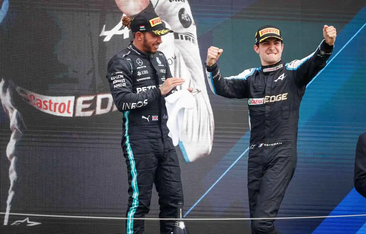 Esteban Ocon and Lewis Hamilton on the podium of the Hungarian GP, August 2021.