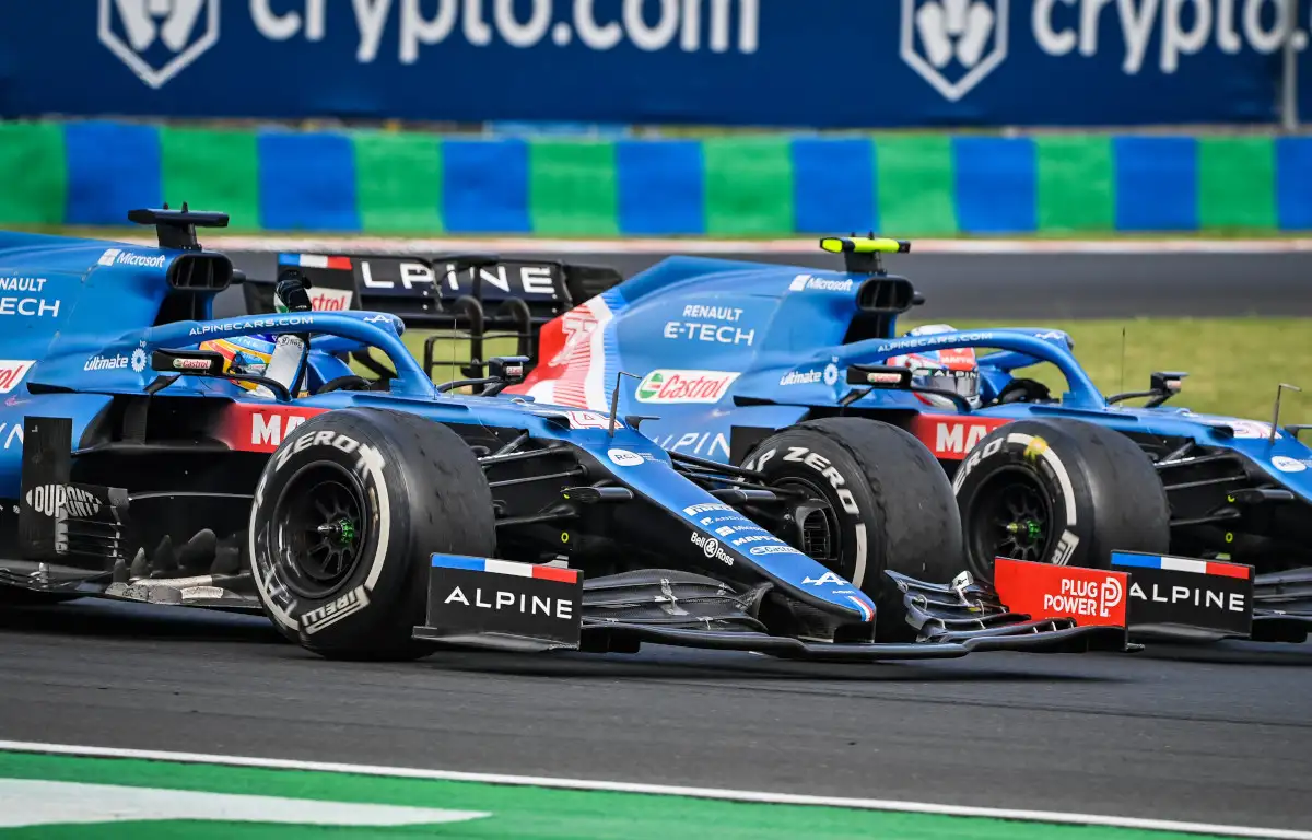Alpine driver Fernando Alonso salutes Esteban Ocon. Hungary August 2021.