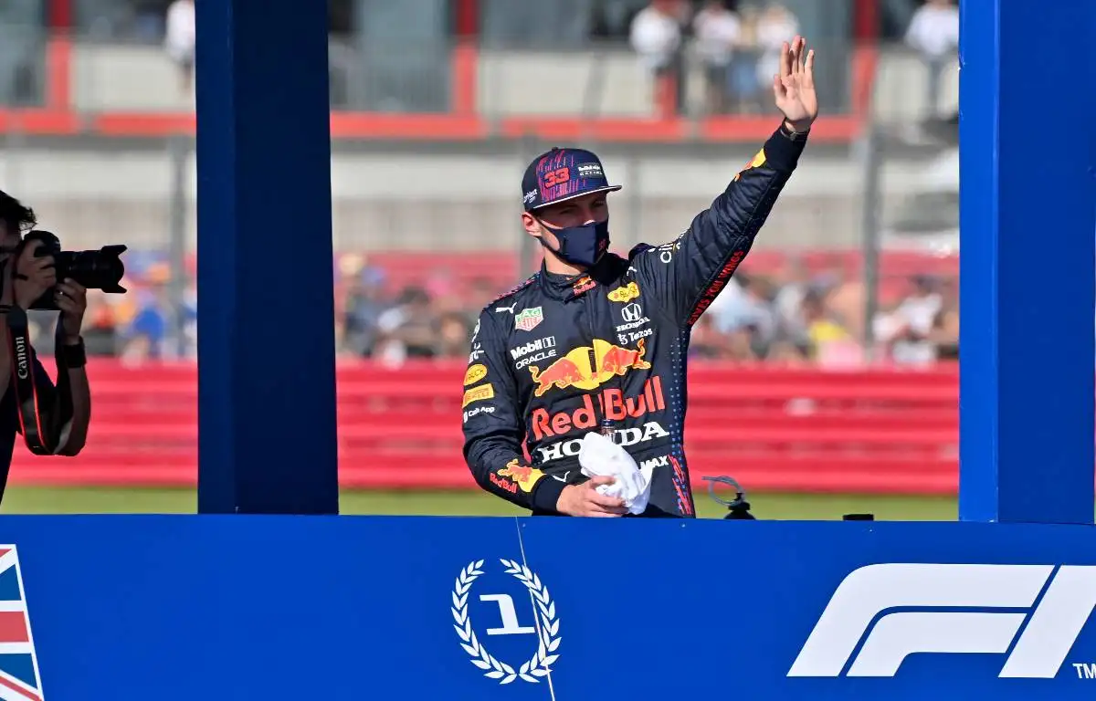 Max Verstappen waves to the Silvestone crowd. July, 2021.