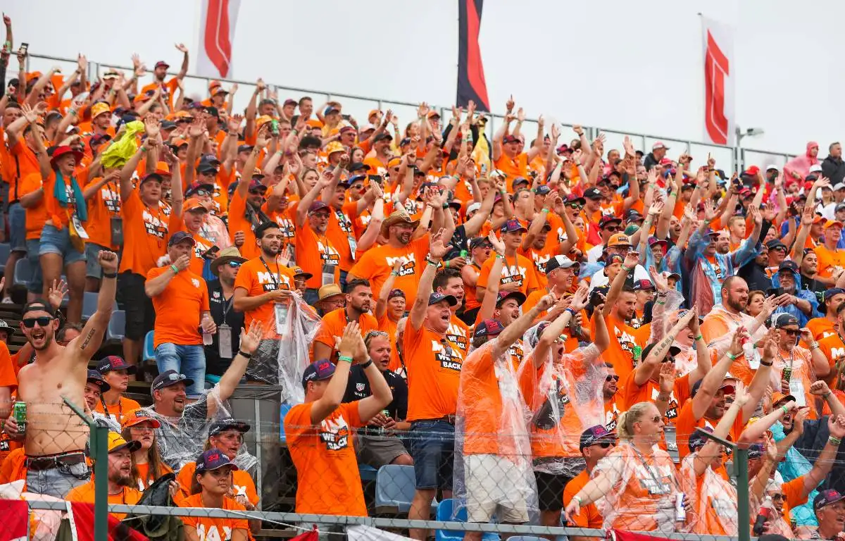 Dutch fans cheer on Max Verstappen at the Hungarian GP. Hungaroring August 2021.