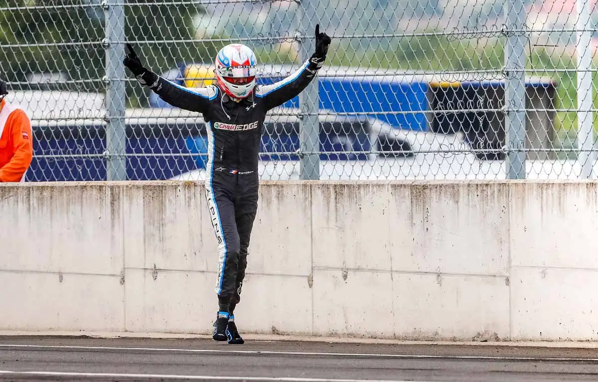 Alpine driver Esteban Ocon celebrates winning the Hungarian GP in 2021.