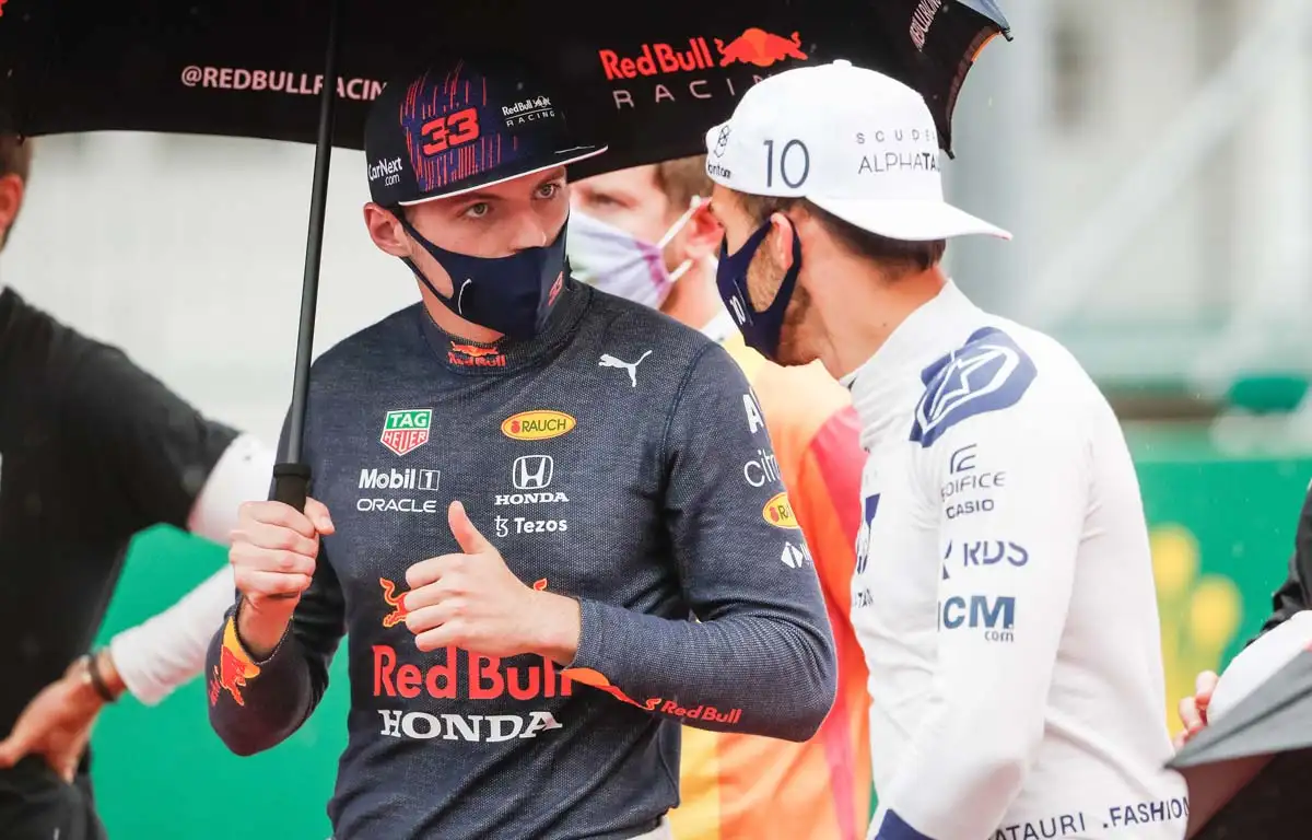 Max Verstappen and Pierre Gasly speak on the grid