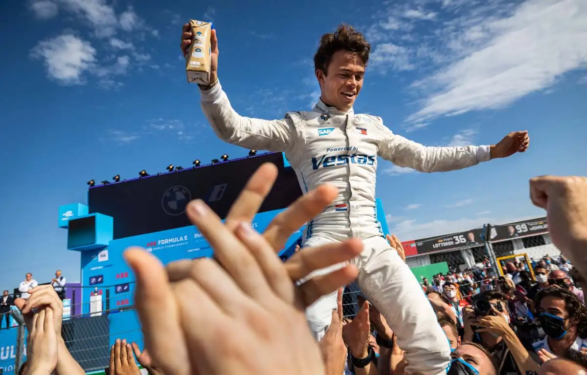 Nyck de Vries celebrates winning the Formula E title.