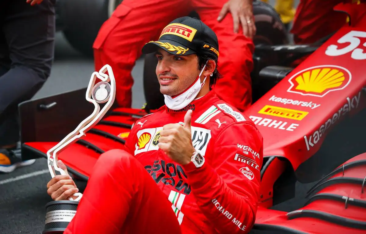 Ferrari's Carlos Sainz poses with his Monaco P2 trophy. May, 2021.