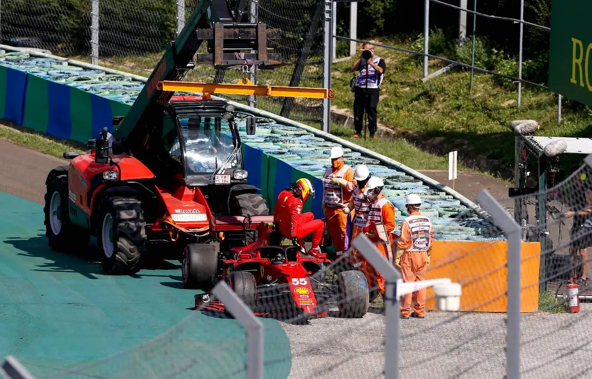 Carlos Sainz exits his Ferrari after crashing in Hungary qualifying. July, 2021.