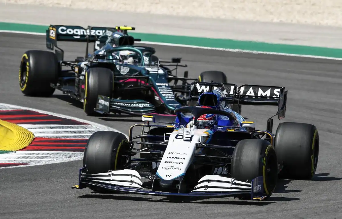 George Russell ahead of Sebastian Vettel during the Portuguese GP. Portimao May 2021.