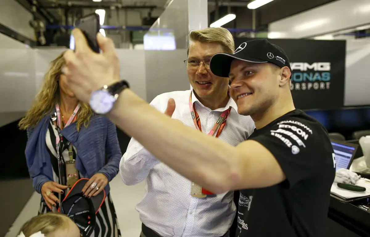 Valtteri Bottas takes a selfie with Mika Hakkinen. Abu Dhabi November 2017.