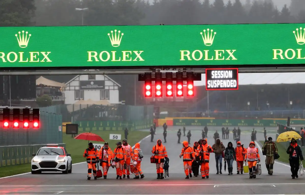 Marshals on track after the Belgian GP was ended due to rain. Formula 1 Spa-Francorchamps August 2021.