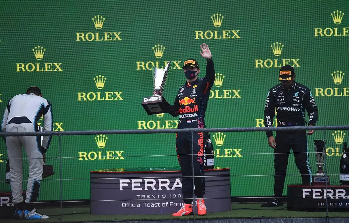 Max Verstappen waves from the Belgian GP podium. Spa-Francorchamps August 2021.