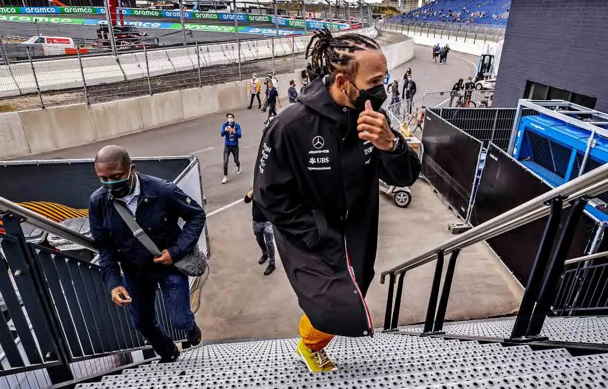 Lewis Hamilton heads up stairs ahead of the Dutch GP. September 2021.