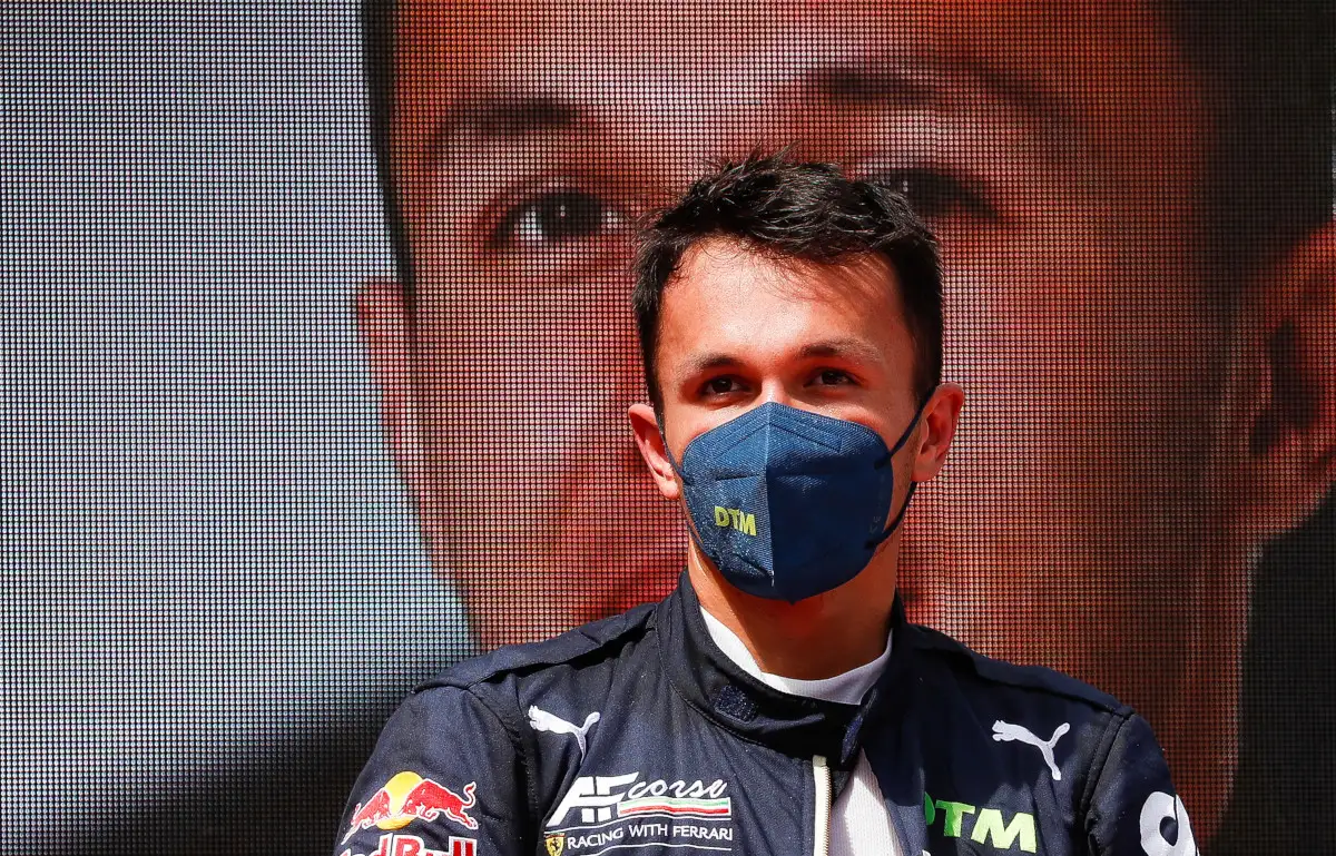 Alex Albon standing in front of a photo of himself. Zolder August 2021