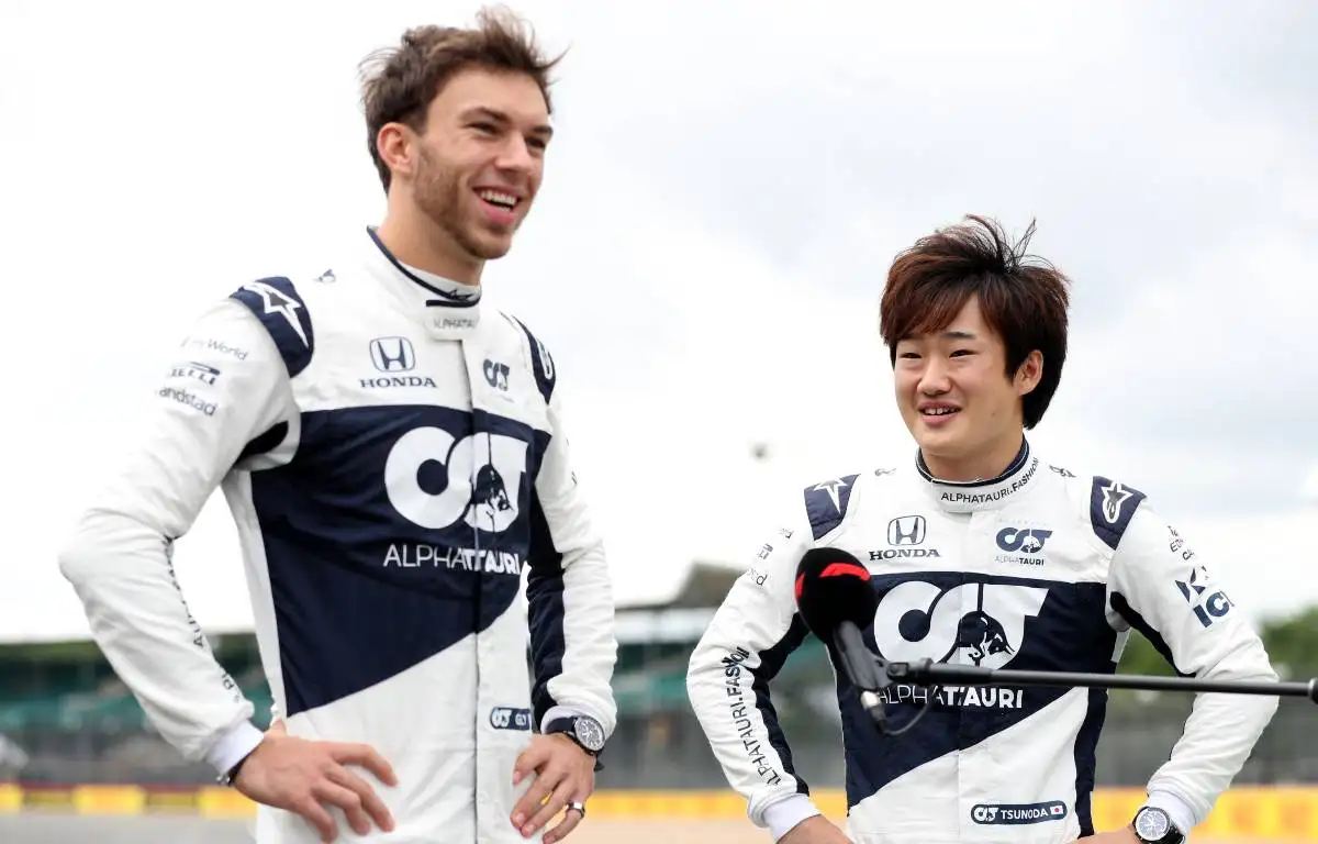 Pierre Gasly and Yuki Tsunoda smiling at the British GP. Silverstone July 2021.