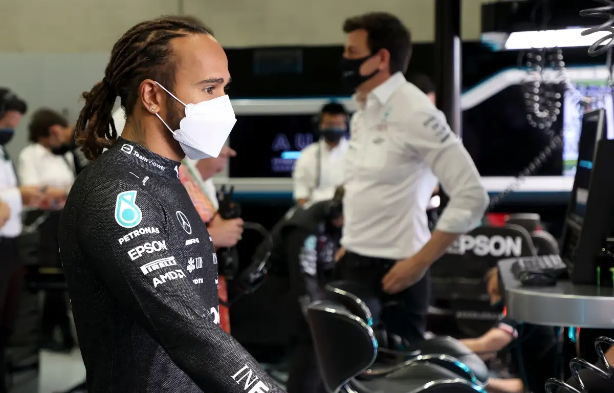 Lewis Hamilton and Toto Wolff standing in the Mercedes garage. Austria July 2021