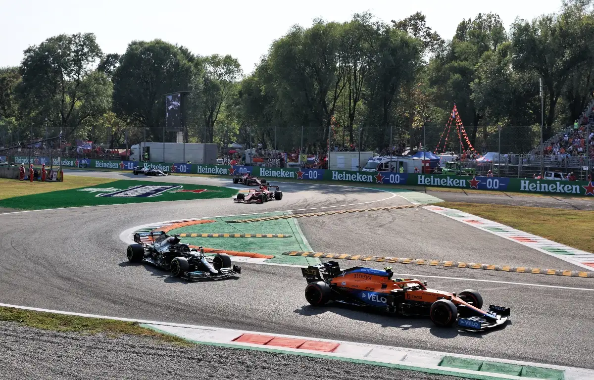 Lando Norris holds off Lewis Hamilton. Italy September 2021