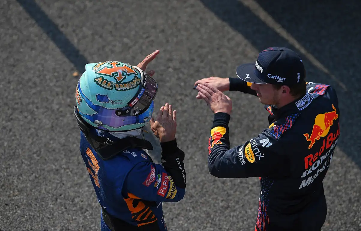 Daniel Ricciardo explains to Max Verstappen. Italy September 2021.