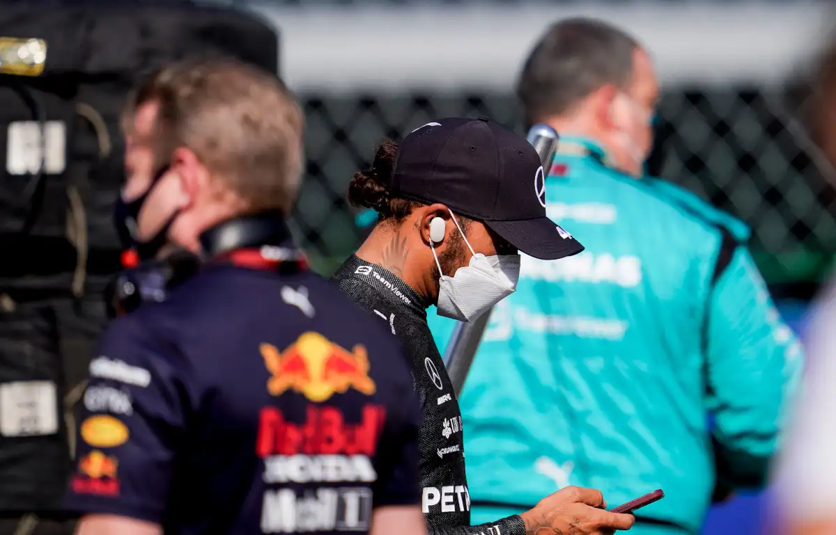 Lewis Hamilton looking at his cellphone. Italy September 2021.