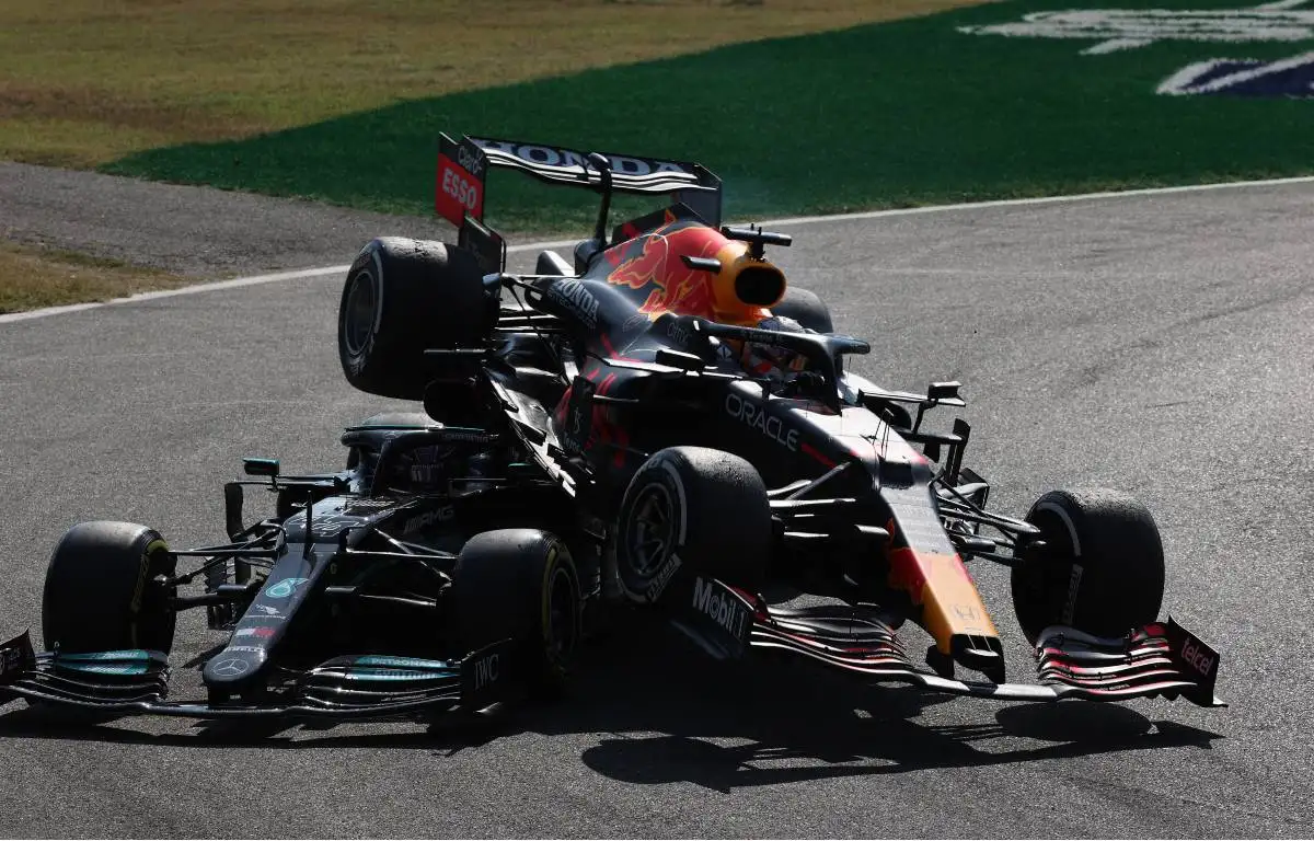 Max Verstappen's Red Bull on top of Lewis Hamilton's Mercedes at the Italian GP. Monza September 2021.