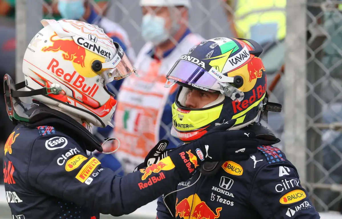 Max Verstappen hand on Sergio Perez. Italy September 2021