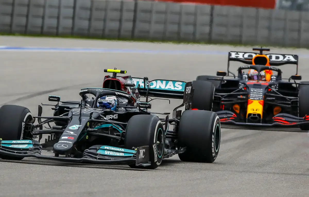Valtteri Bottas racing in front of Max Verstappen. Russia September 2021
