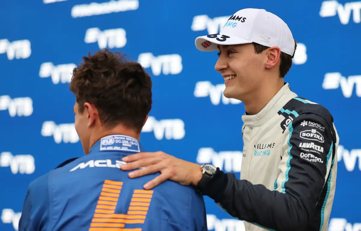 George Russell smiling with Lando Norris. Russia September 2021