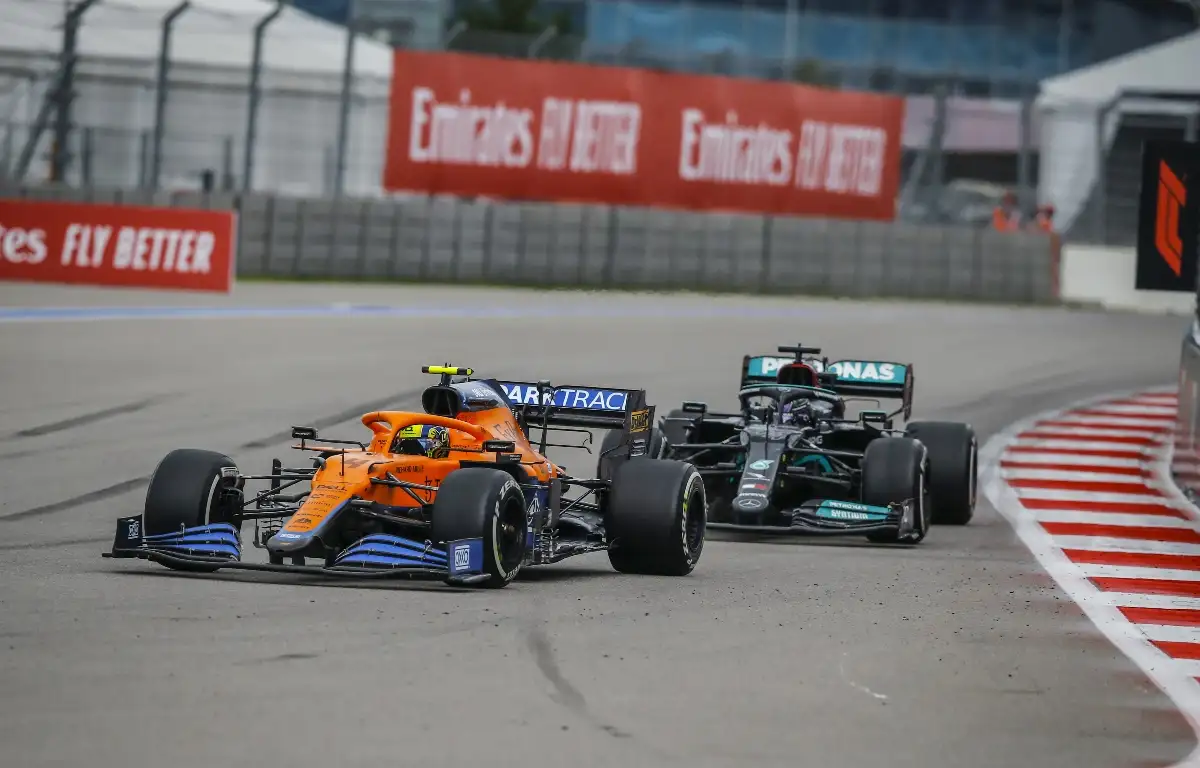 Lando Norris and Lewis Hamilton racing at Sochi. Russia September 2021