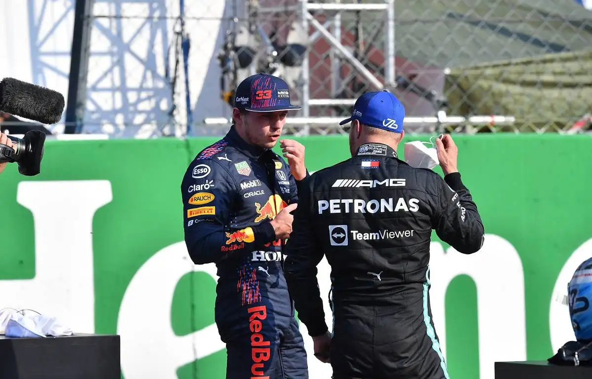 Max Verstappen talks to Valtteri Bottas at the Italian GP. Monza September 2021.
