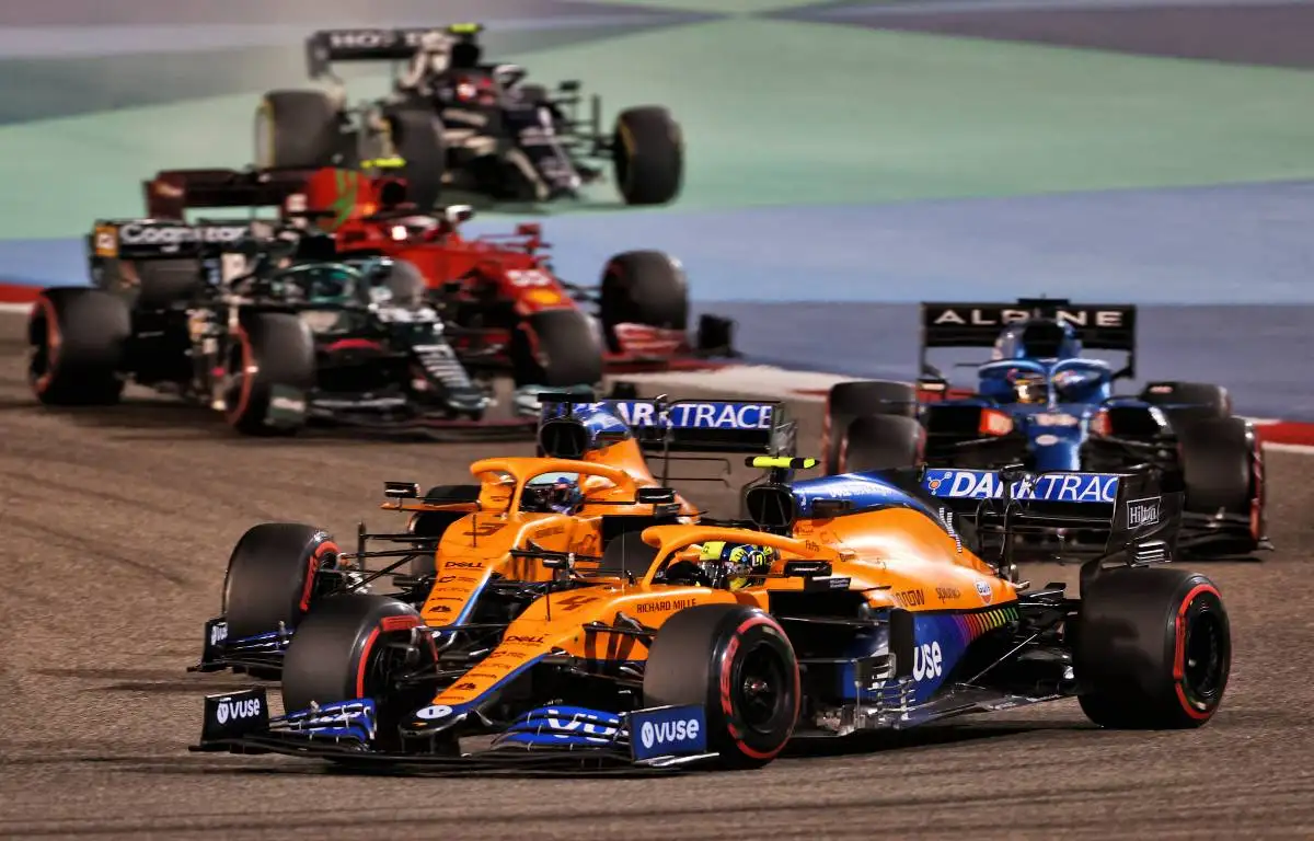 Lando Norris and Daniel Ricciardo vie during the Bahrain GP. Sakhir March 2021.