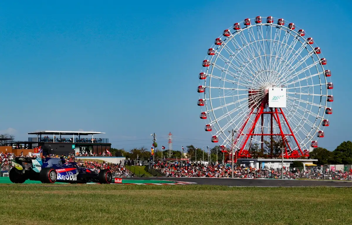 Pierre Gasly driving past the Ferris wheel at Suzuka. Japan October 2019