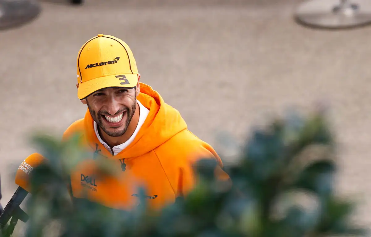 Daniel Ricciardo smiles during an interview.
