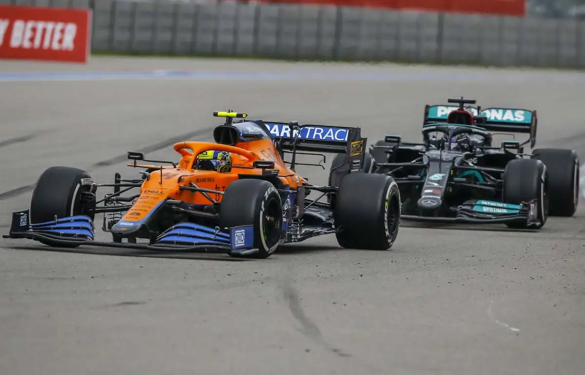 Lando Norris leads Lewis Hamilton. Russia September 2021.