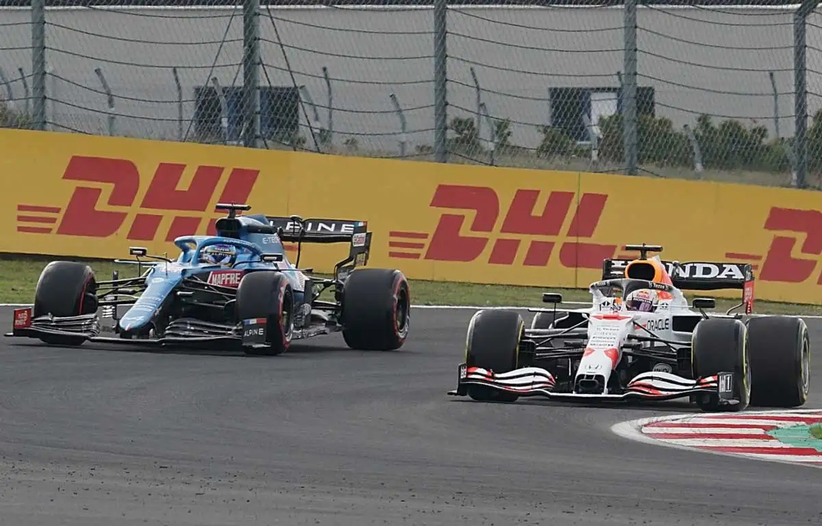 Fernando Alonso alongside Max Verstappen. Istanbul October 2021.