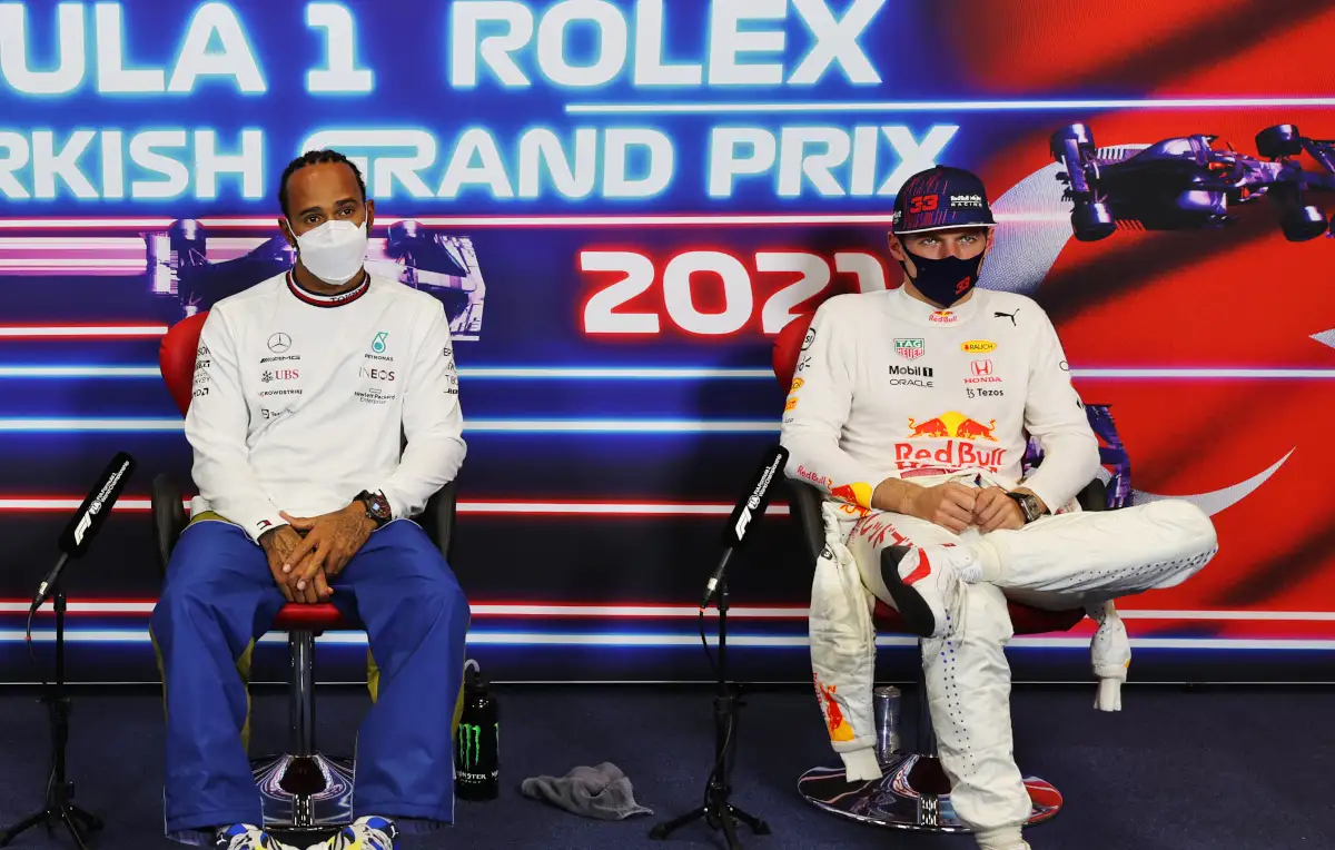Lewis Hamilton and Max Verstappen in white at the press conference. Turkey October 2021