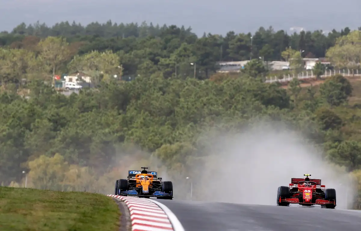 Daniel Ricciardo and Carlos Sainz run side by side. Turkey October 2021