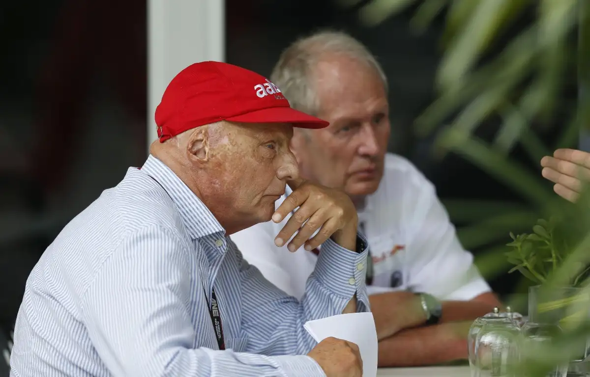 Niki Lauda and Helmut Marko sitting at a table. Malaysia March 2013.