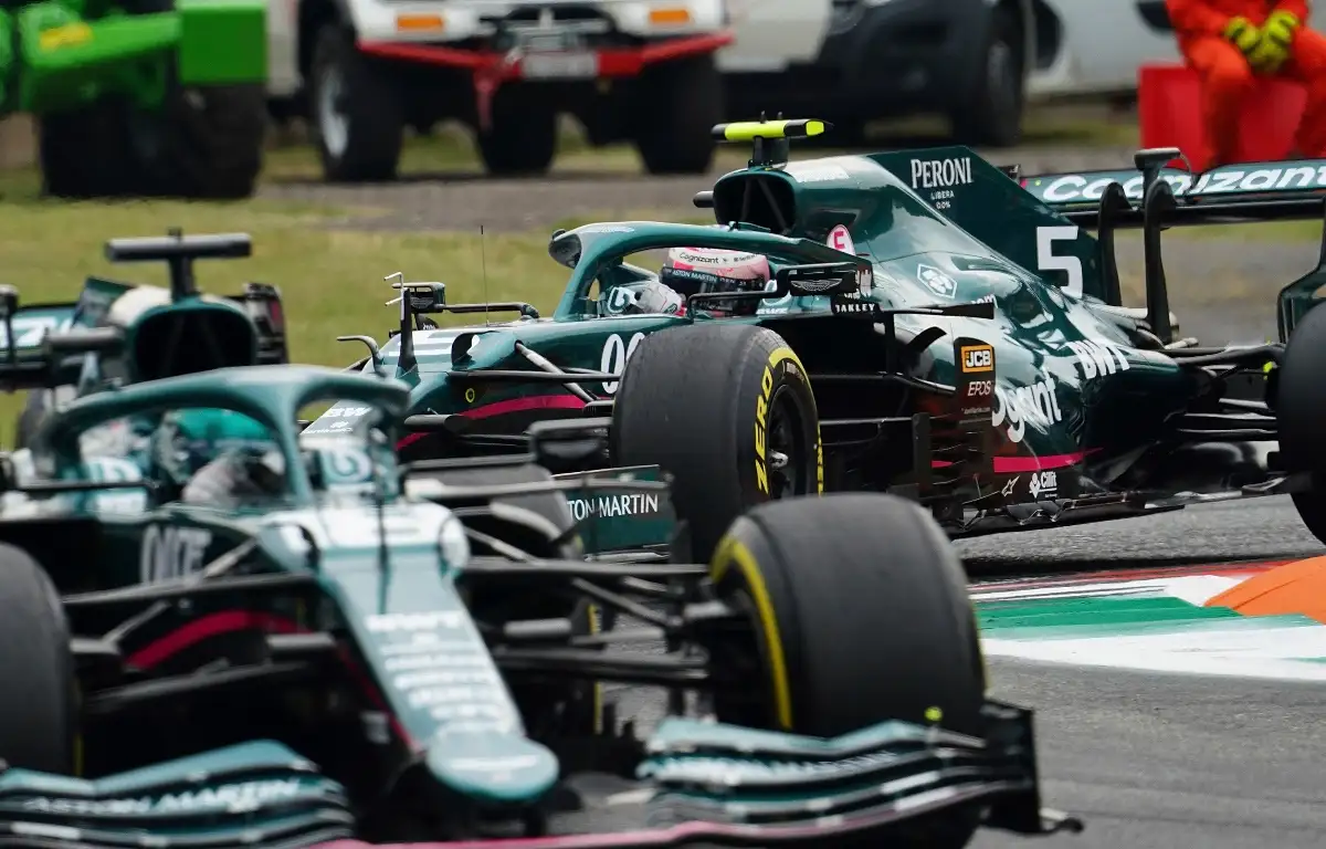 Lance Stroll and Sebastian Vettel racing at the Italian Grand Prix. Italy September 2021