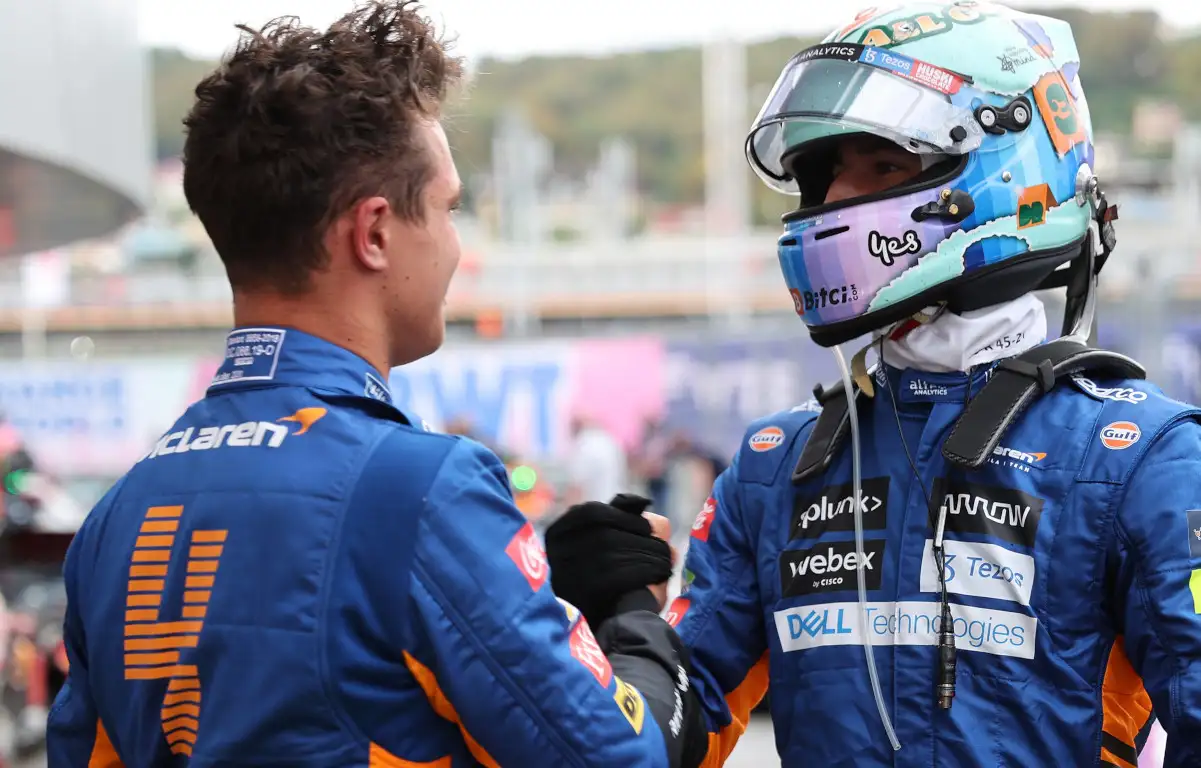 Lando Norris and Daniel Ricciardo shake hands. Russia September 2021