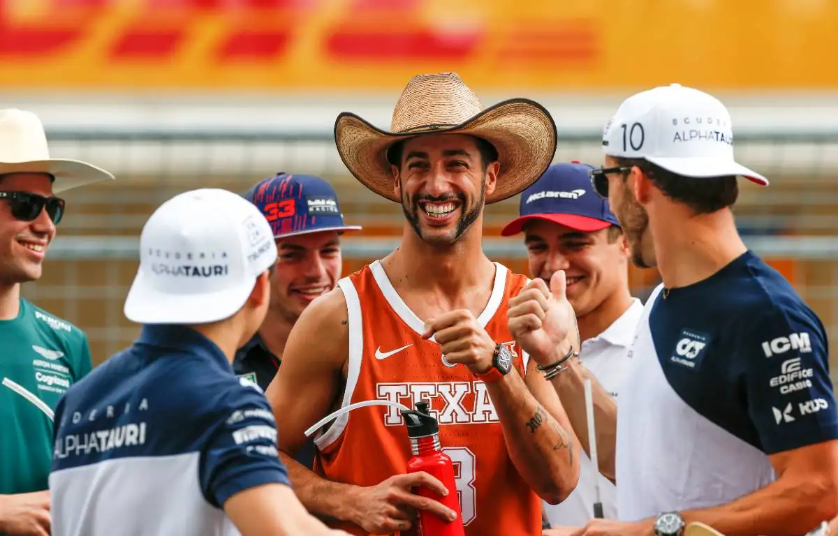 Daniel Ricciardo wearing Texas Longhorns vest and cowboy hat. Austin October 2021.