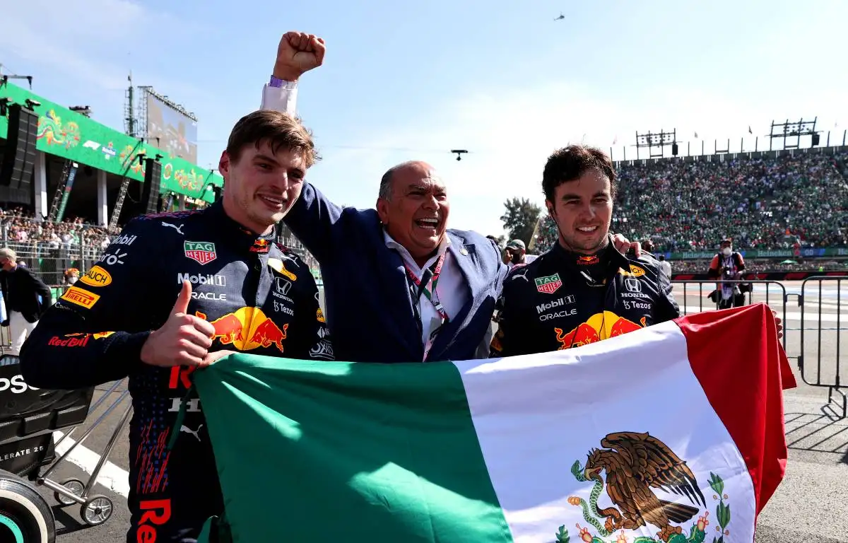 Max Verstappen, Sergio Perez and his father, Antonio, celebrate. Mexico City November 2021.