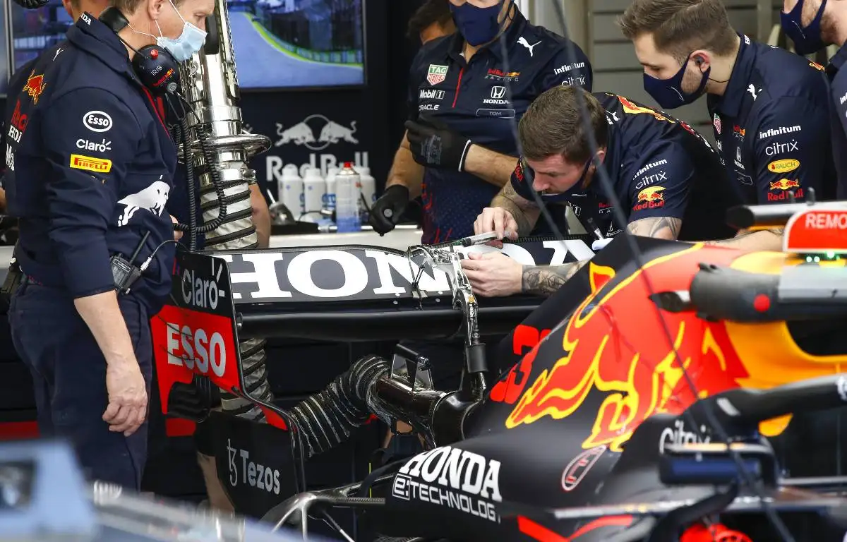 Red Bull mechanics working on the RB16B rear wing. Brazil, November 2021.