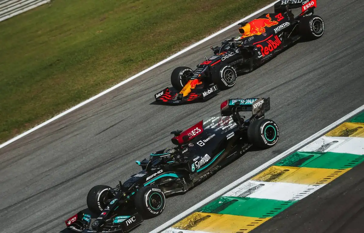 Lewis Hamilton, Mercedes, and Max Verstappen, Red Bull, on-track. Brazil, November 2021.