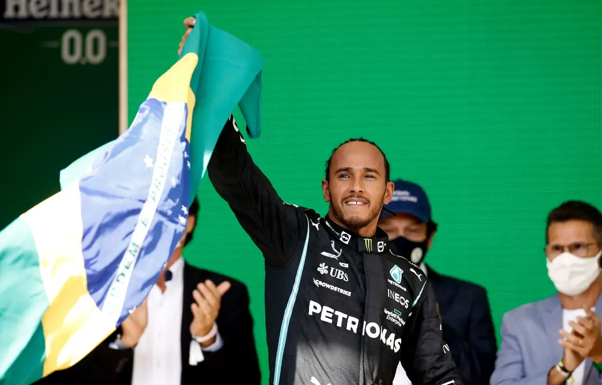 Lewis Hamilton holds a flag of Brazil. Sao Paulo November 2021.