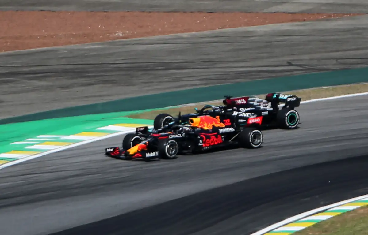 Red Bull driver Max Verstappen and Mercedes driver Lewis Hamilton about to run wide. Brazil November 2021